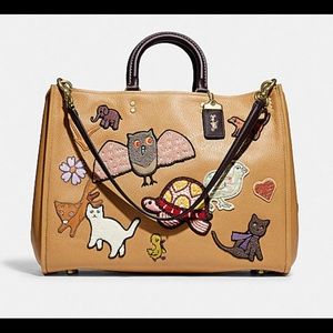 Coach Rogue 39 with Creature Patches NWT